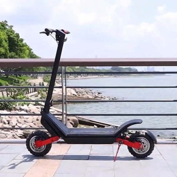 Electric scooter on a balcony with a view of water and trees
